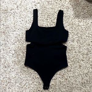 Never worn black cut out Leo size small. A&F